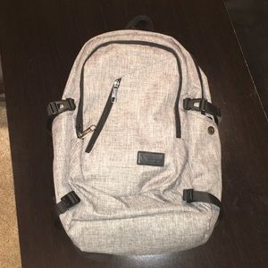 Charging Backpack with zipper locks
